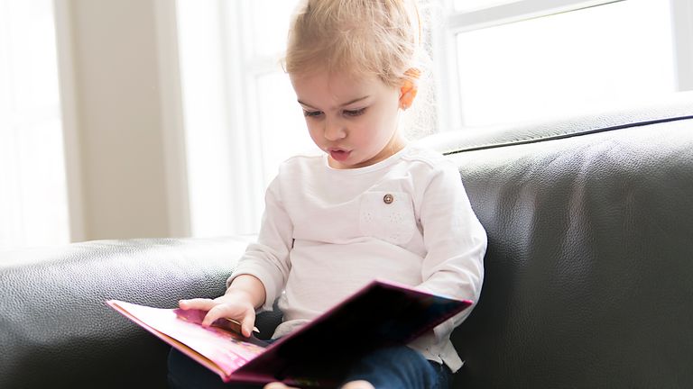 Survey finds many children try to swipe books like smartphones