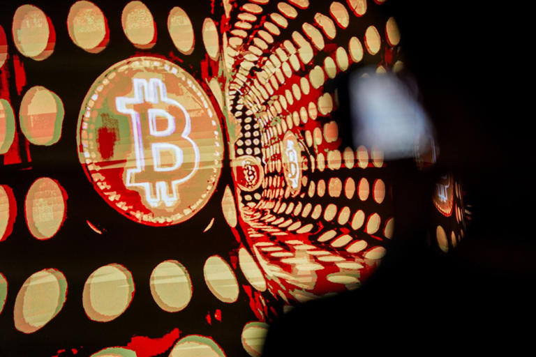 Bitcoin plunges as crypto slide deepens…